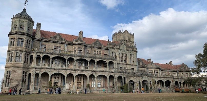 Beautiful view of Shimla hill station in Himachal Pradesh, featbali-international.jpguring colonial architecture, lush green hills, and the Himalayan backdrop.